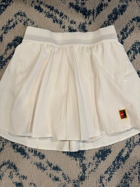 NIKE White Pleated Circle Skirt with Logo Patch